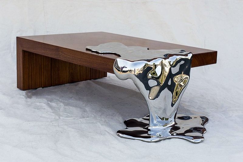 table with one leg melting metal